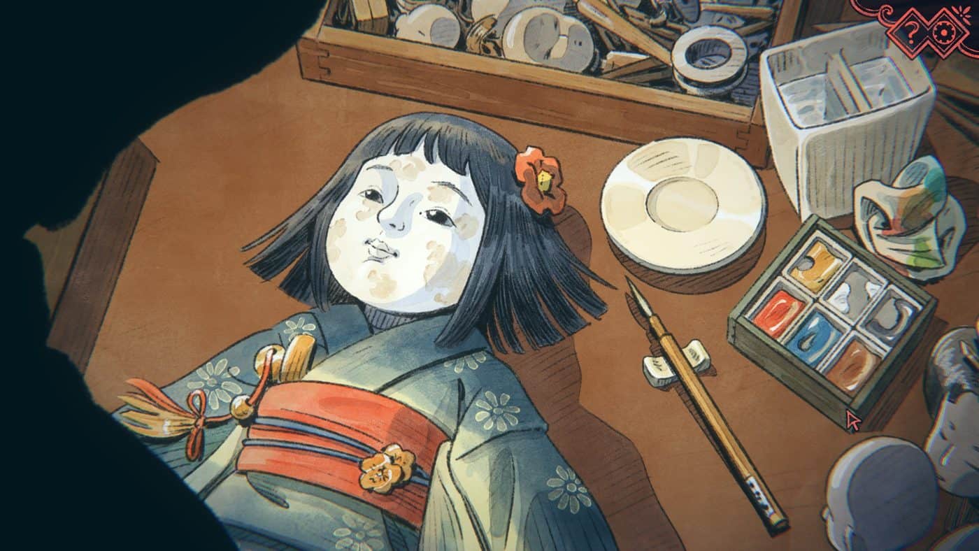 Mrs Fujimoto's doll on the workshop table, seen from above, with watercolours and brush ready to repaint her face.